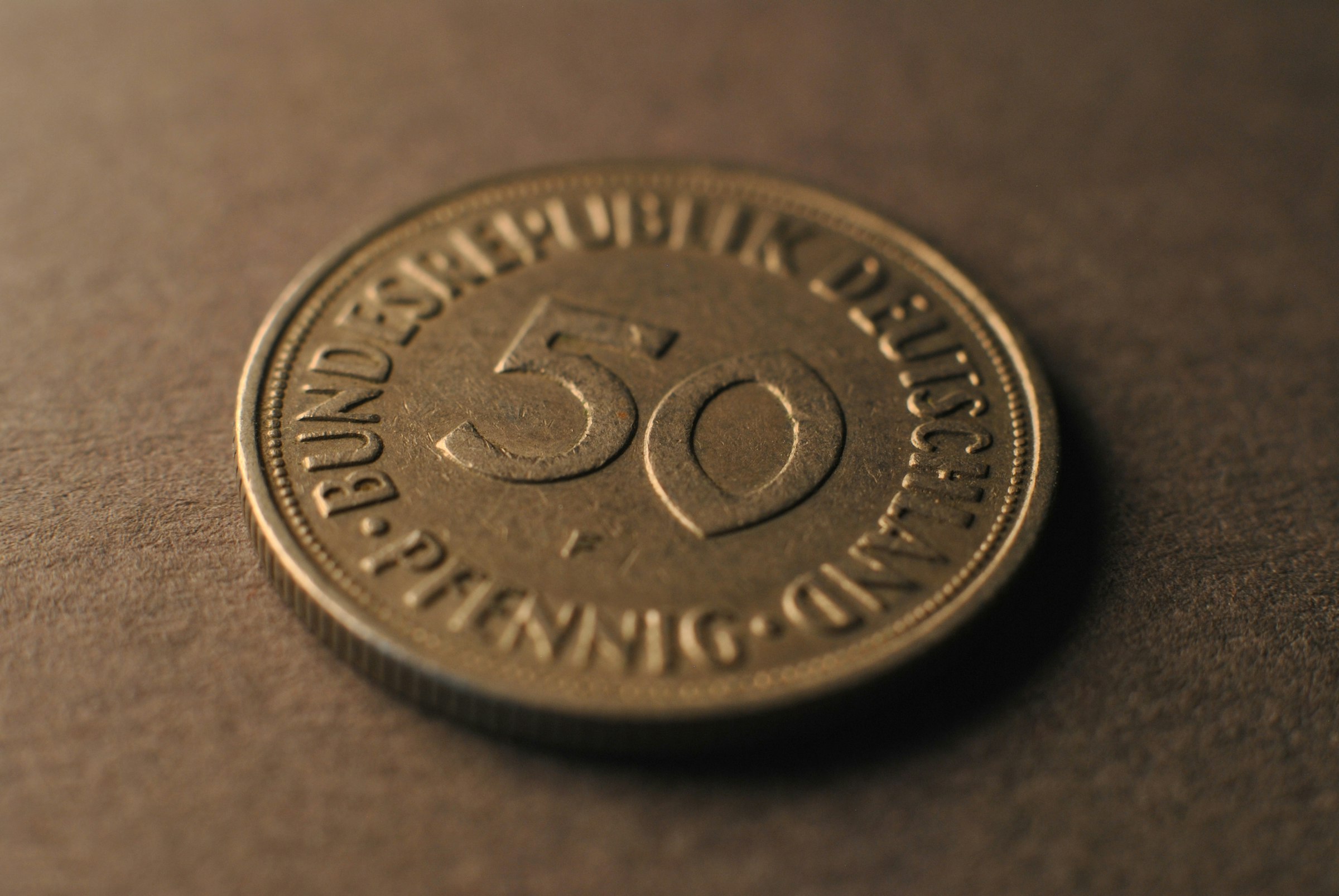 A close up of a coin on a table