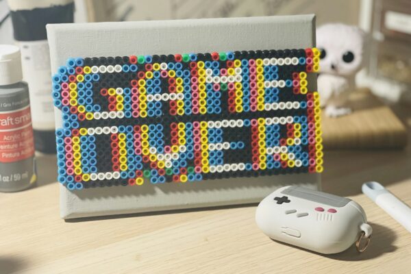 a nintendo wii game controller sitting on top of a table