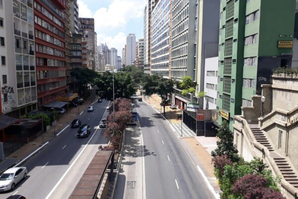 cars on road near buildings during daytime