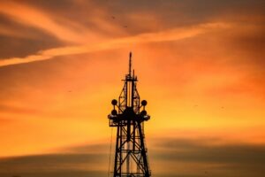a very tall tower with a sky in the background