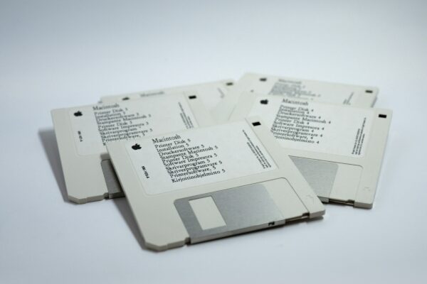 four MacBook diskettes