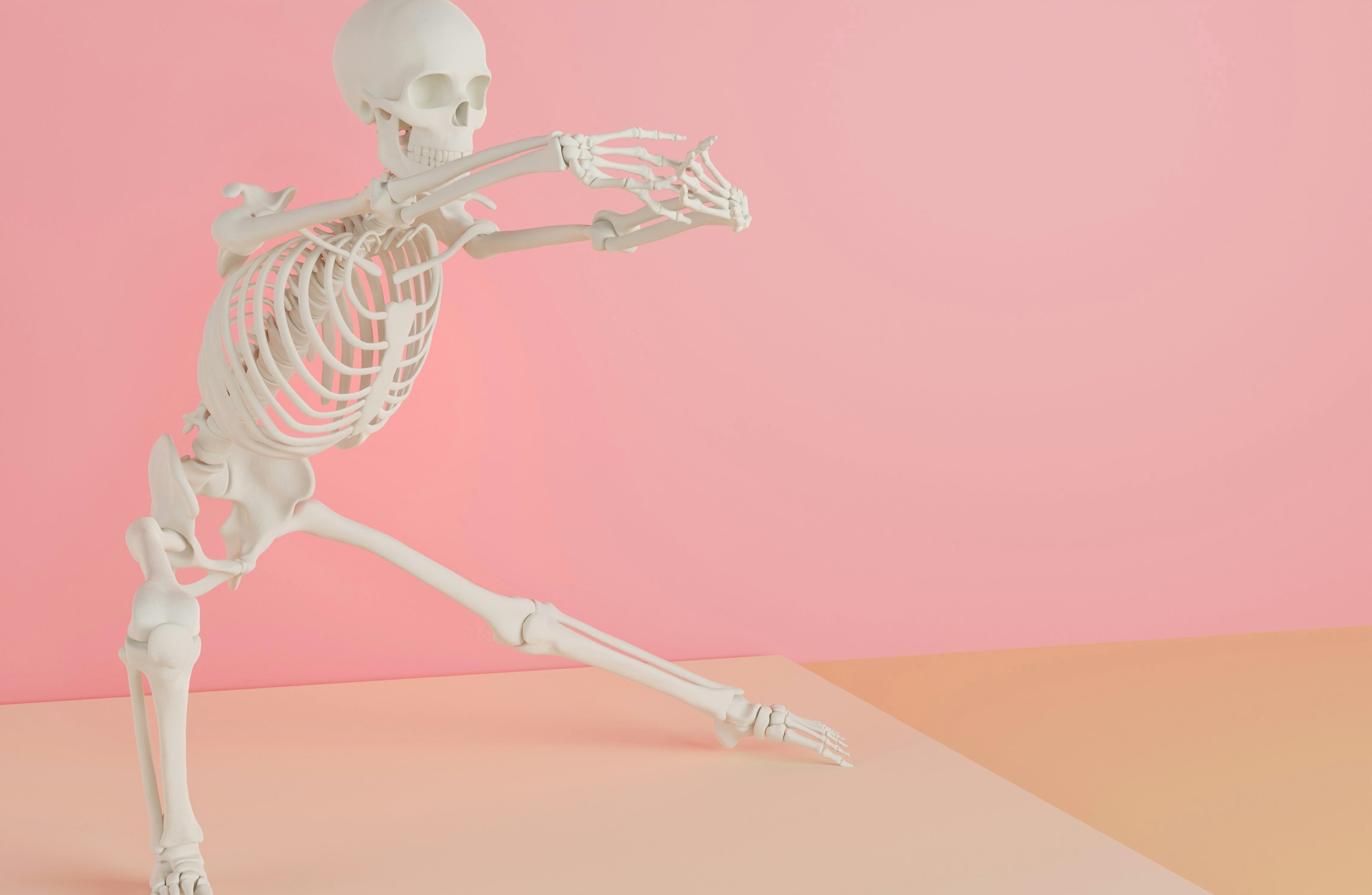 a skeleton is dancing on a pink background