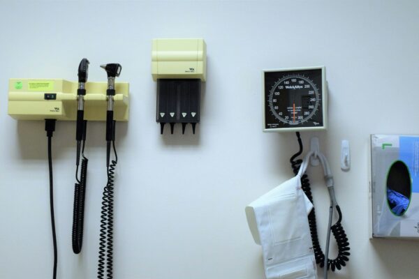 a white wall with a bunch of electrical equipment on it