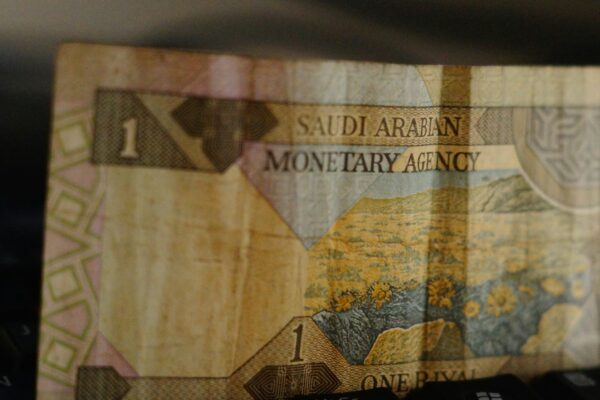 banknote on brown wooden table