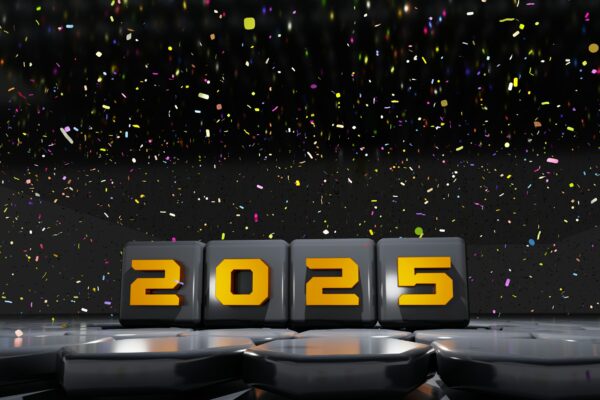 A black and yellow clock sitting on top of a table