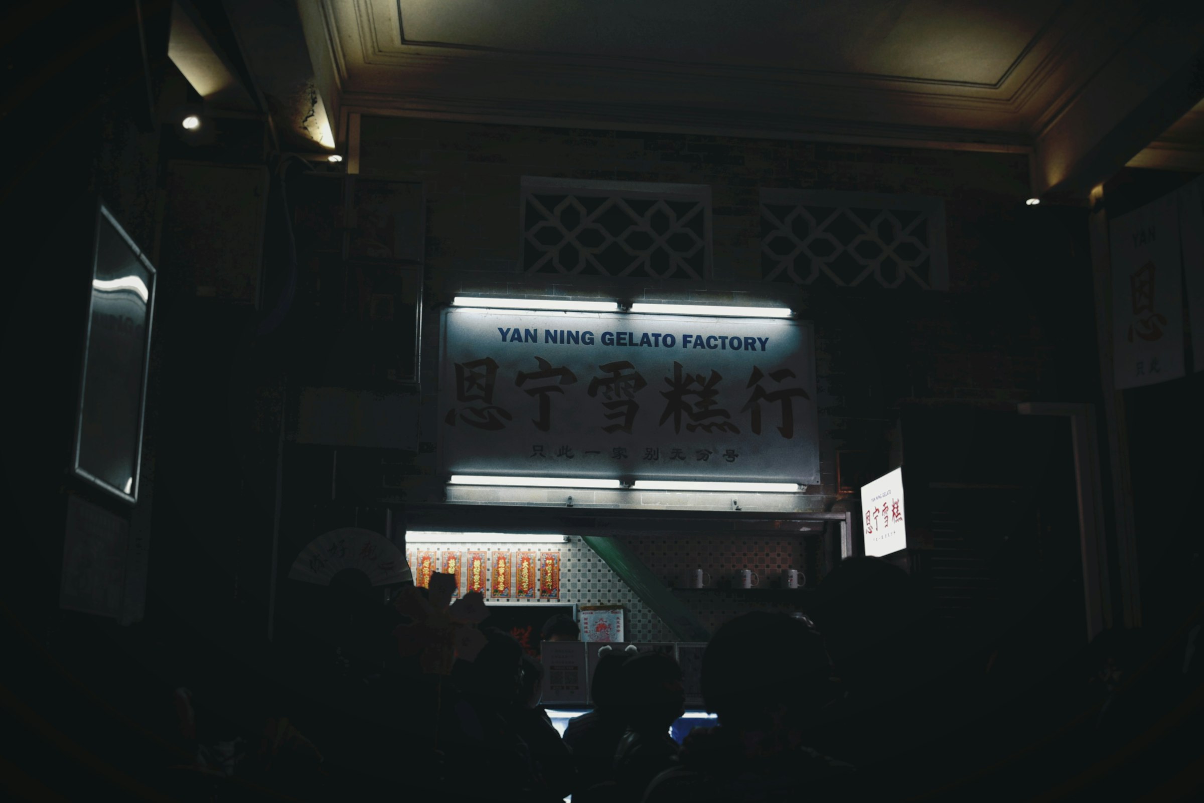 a group of people standing in front of a building