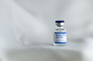 white and yellow labeled bottle