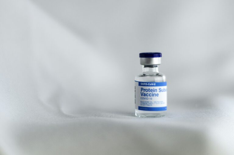 white and yellow labeled bottle