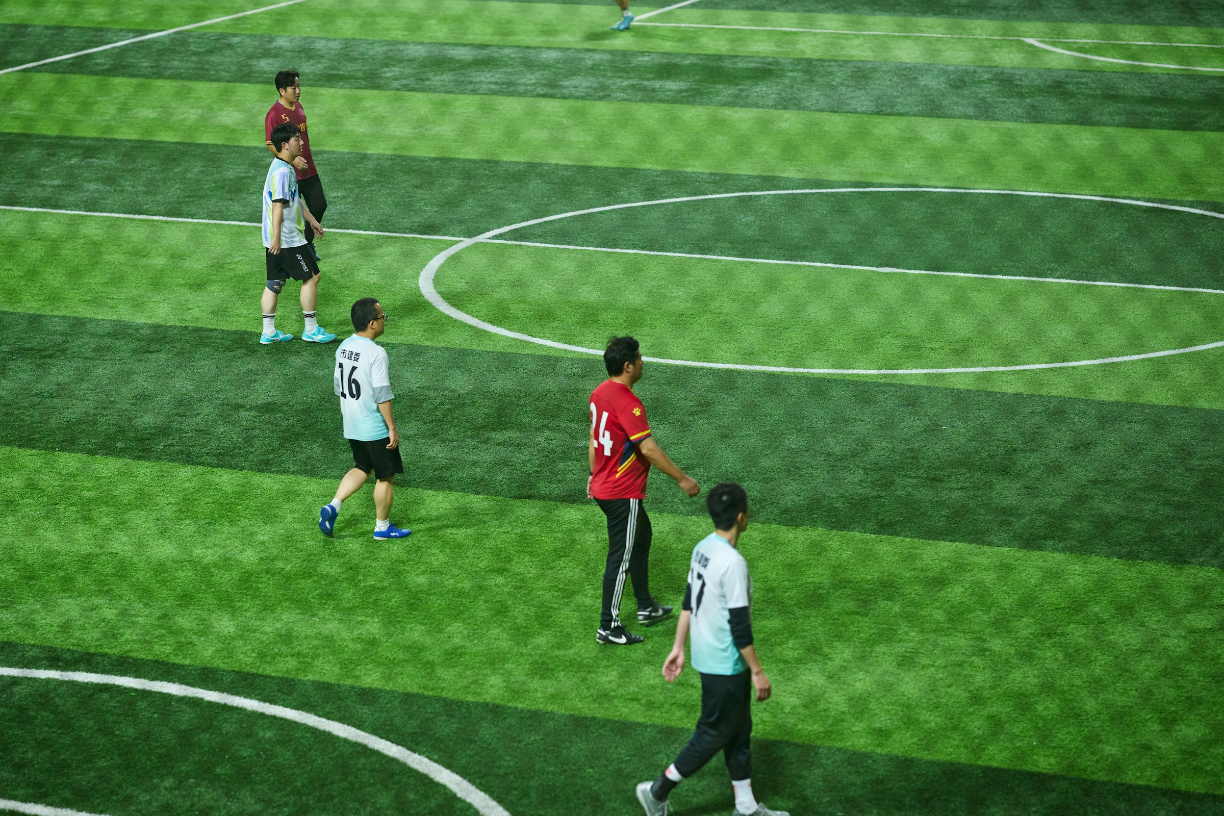 Soccer players on a green field during a game