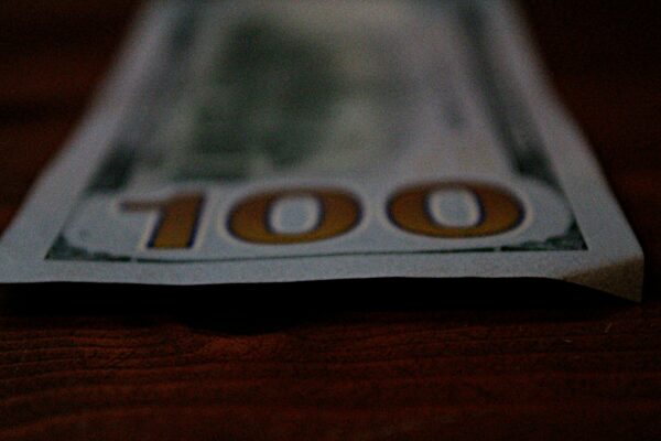 a close up of a hundred dollar bill