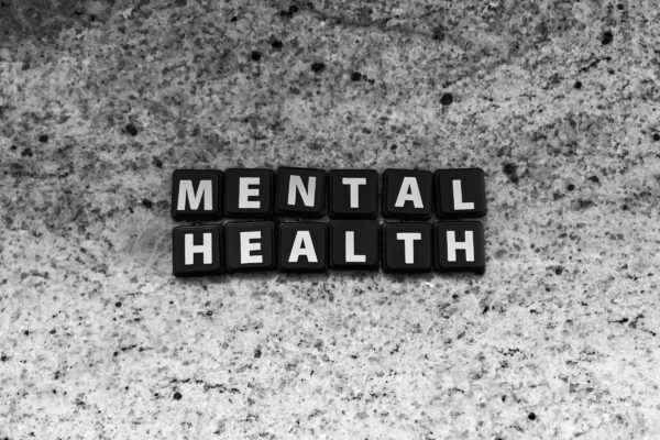 a black and white photo of the word mental health