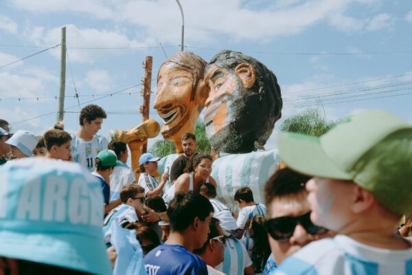 a large group of people standing around a float