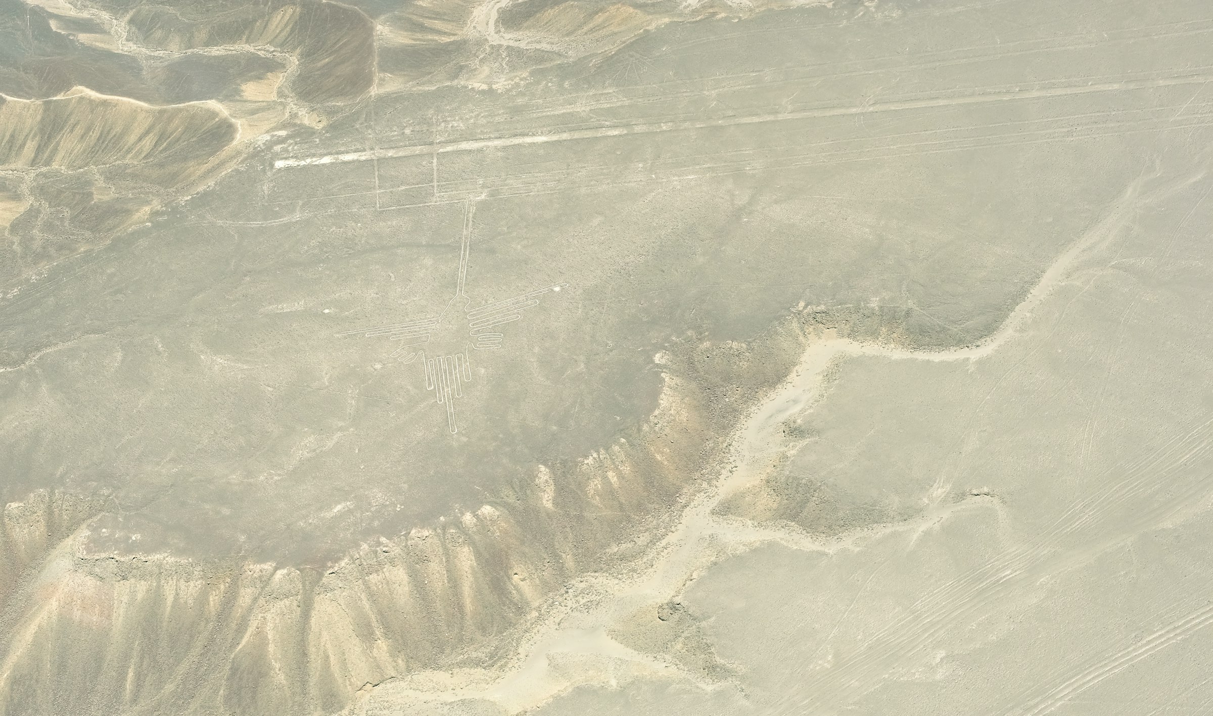 An aerial view of a mountain range with a bird's eye view