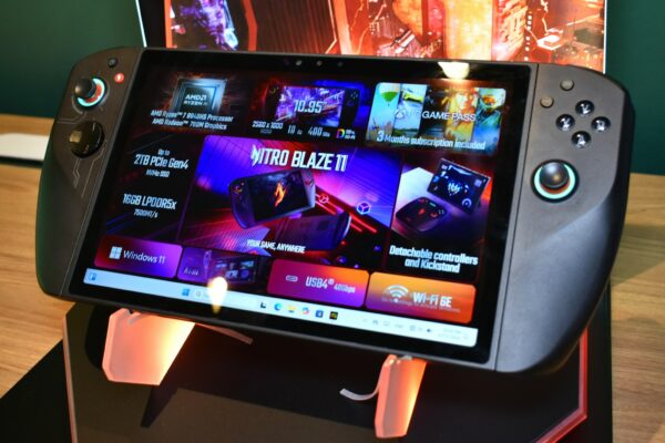 A handheld gaming console with a large screen.