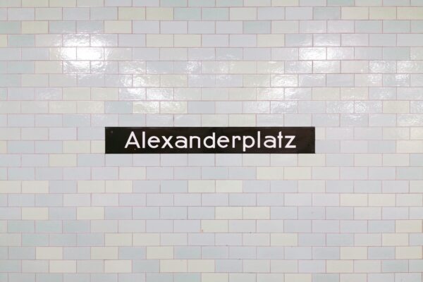 a sign that is on the side of a wall