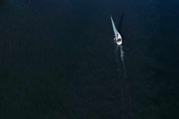 a small boat in a large body of water