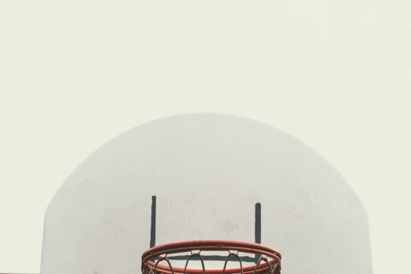 red metal frame on white round wall