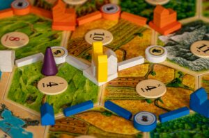 A close up of a board game with many pieces