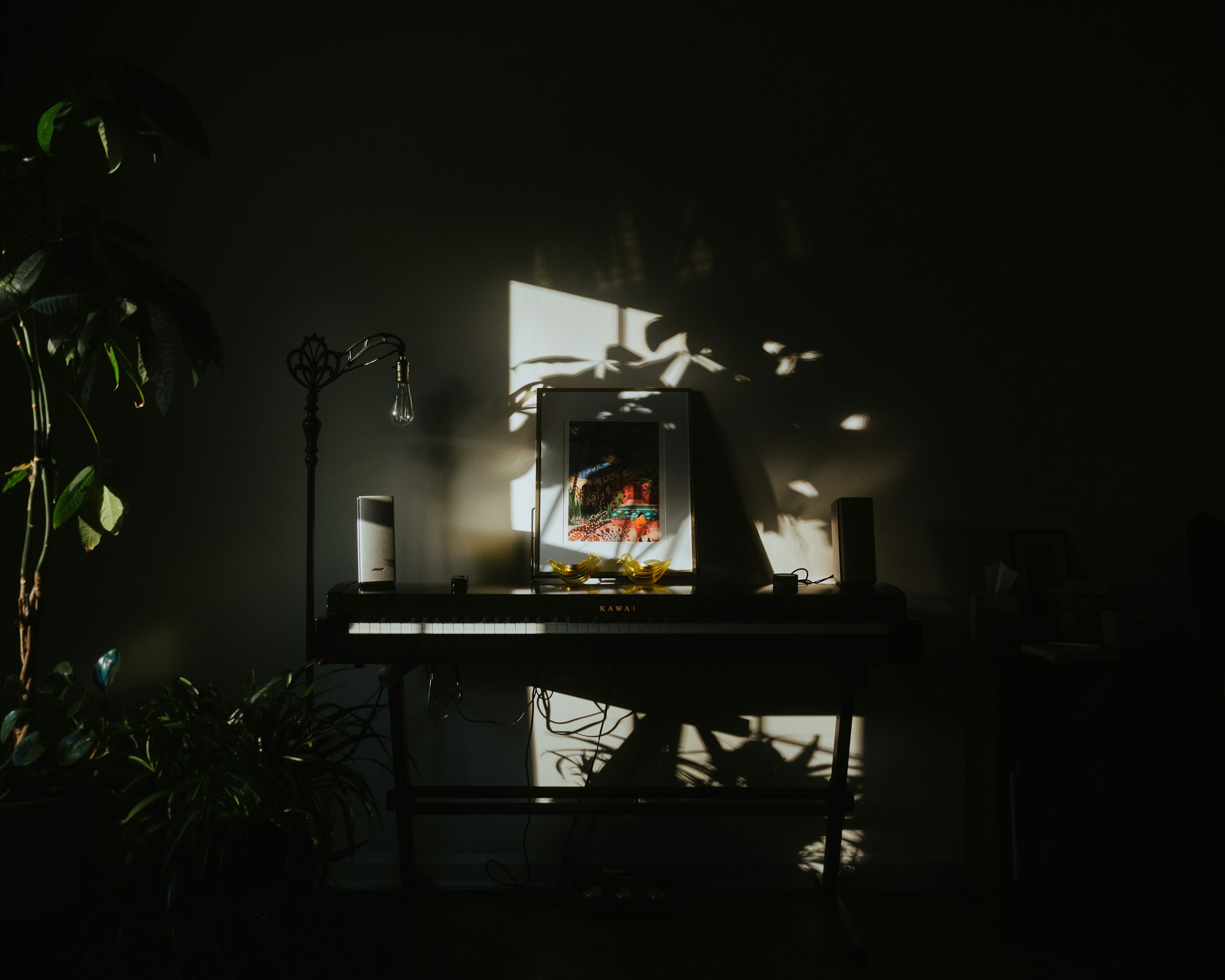 black flat screen tv turned on on black wooden tv rack