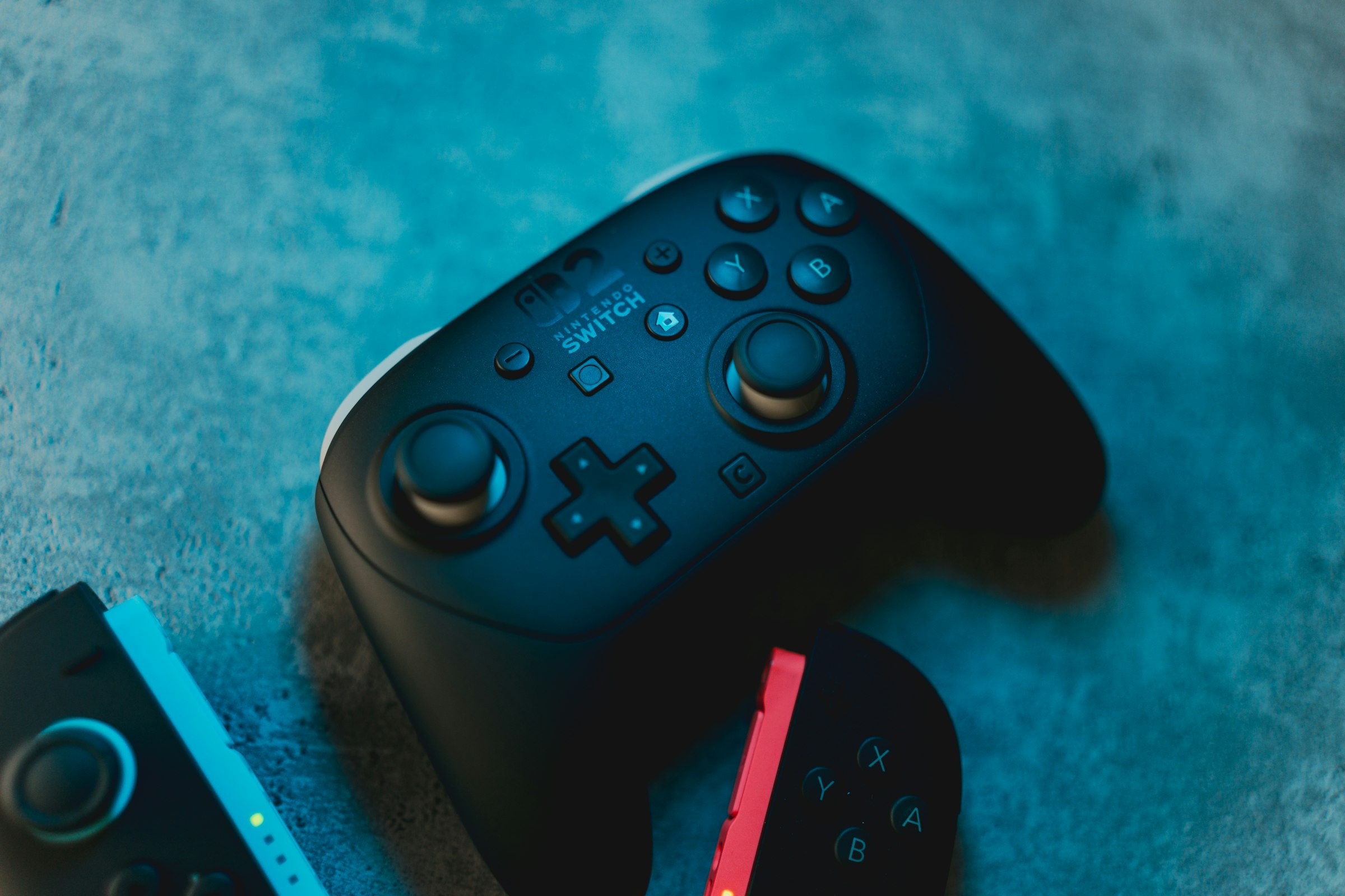 Nintendo switch controllers are shown in the image.