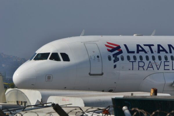 a large jetliner sitting on top of an airport tarmac