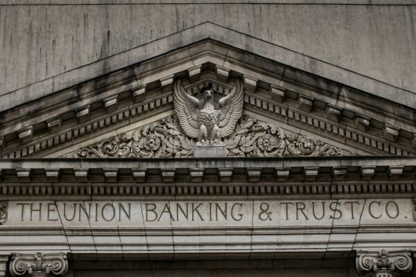 brown concrete building with statue
