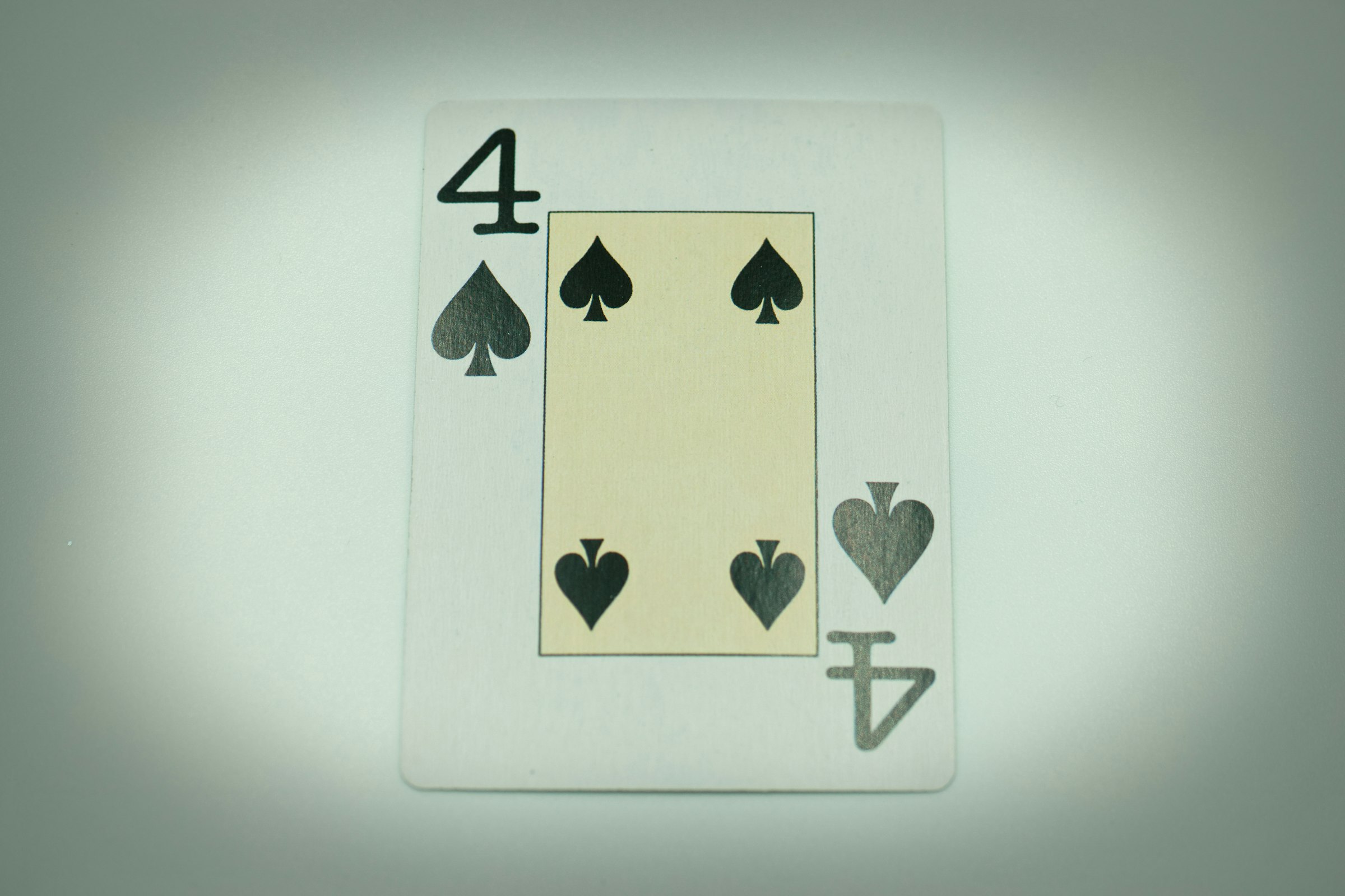 a four of a kind of playing card with four of spades