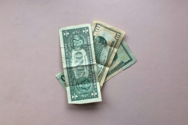 three US dollar banknotes