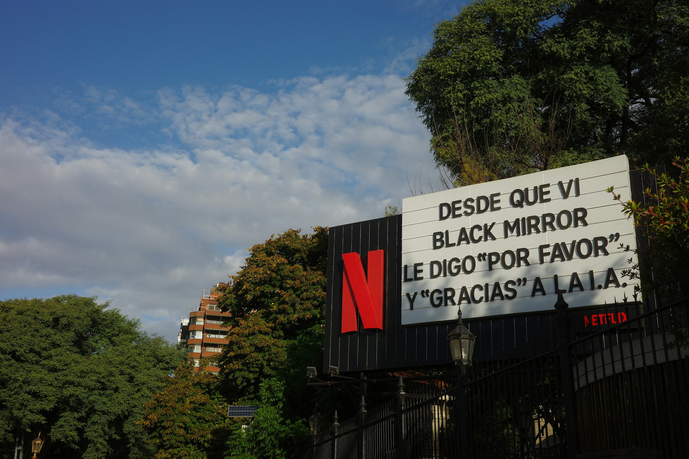 Netflix billboard with "black mirror" quote