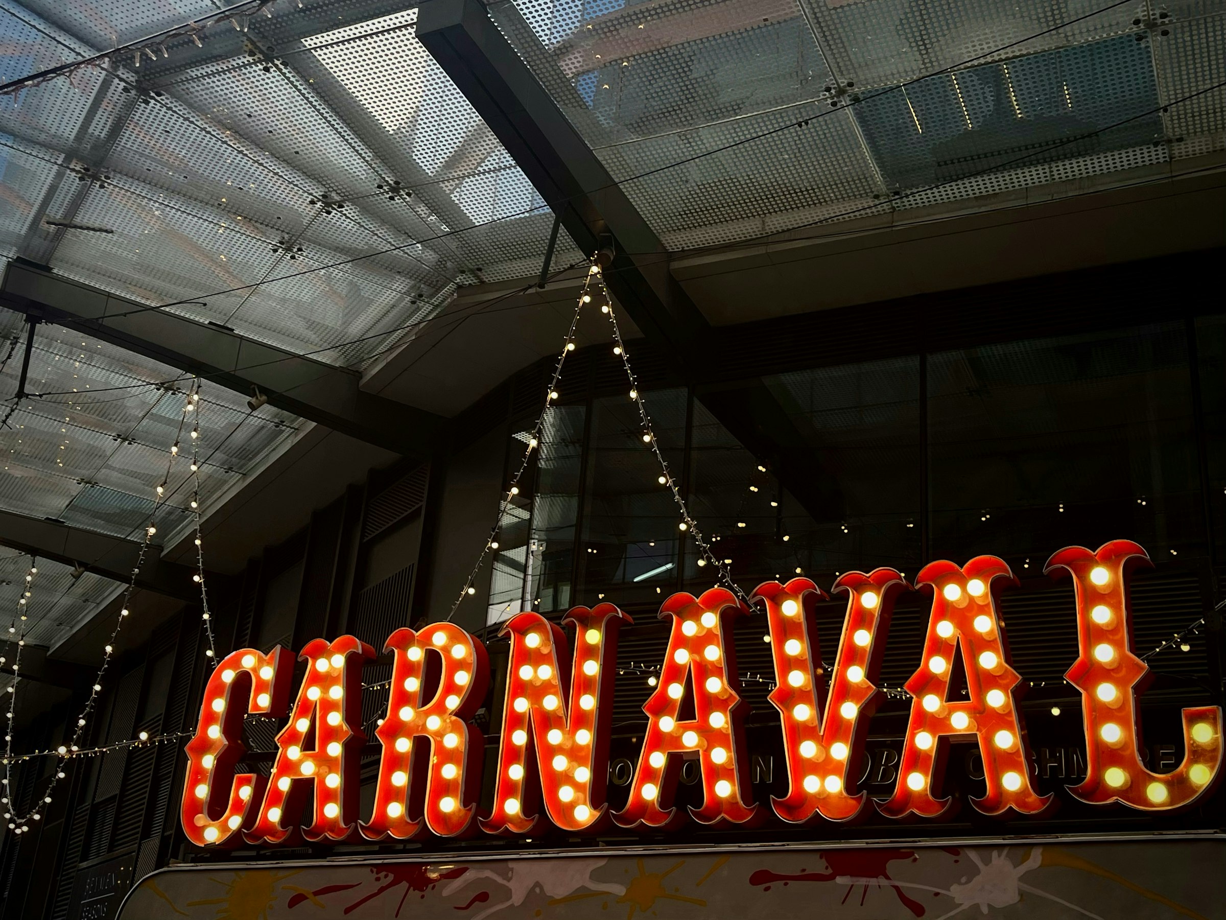 a lighted sign that says lavaraja above it