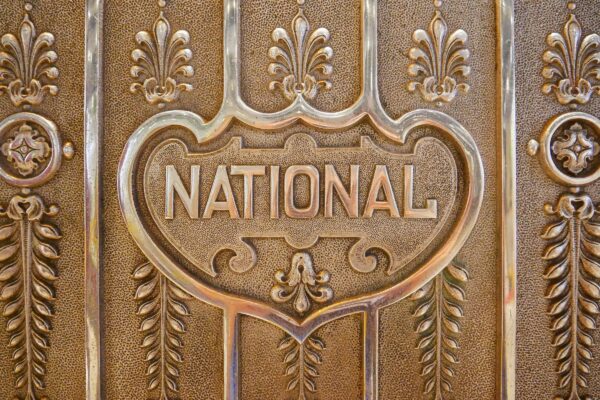 a close up of the national emblem on a door