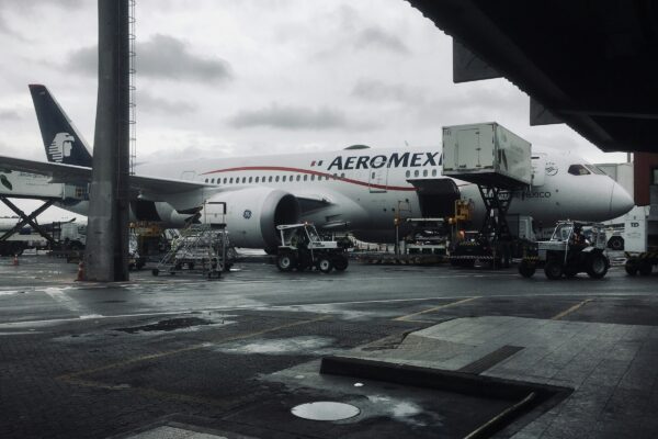 a large airplane is parked at an airport