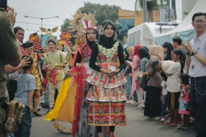 People in colorful traditional costumes at a parade