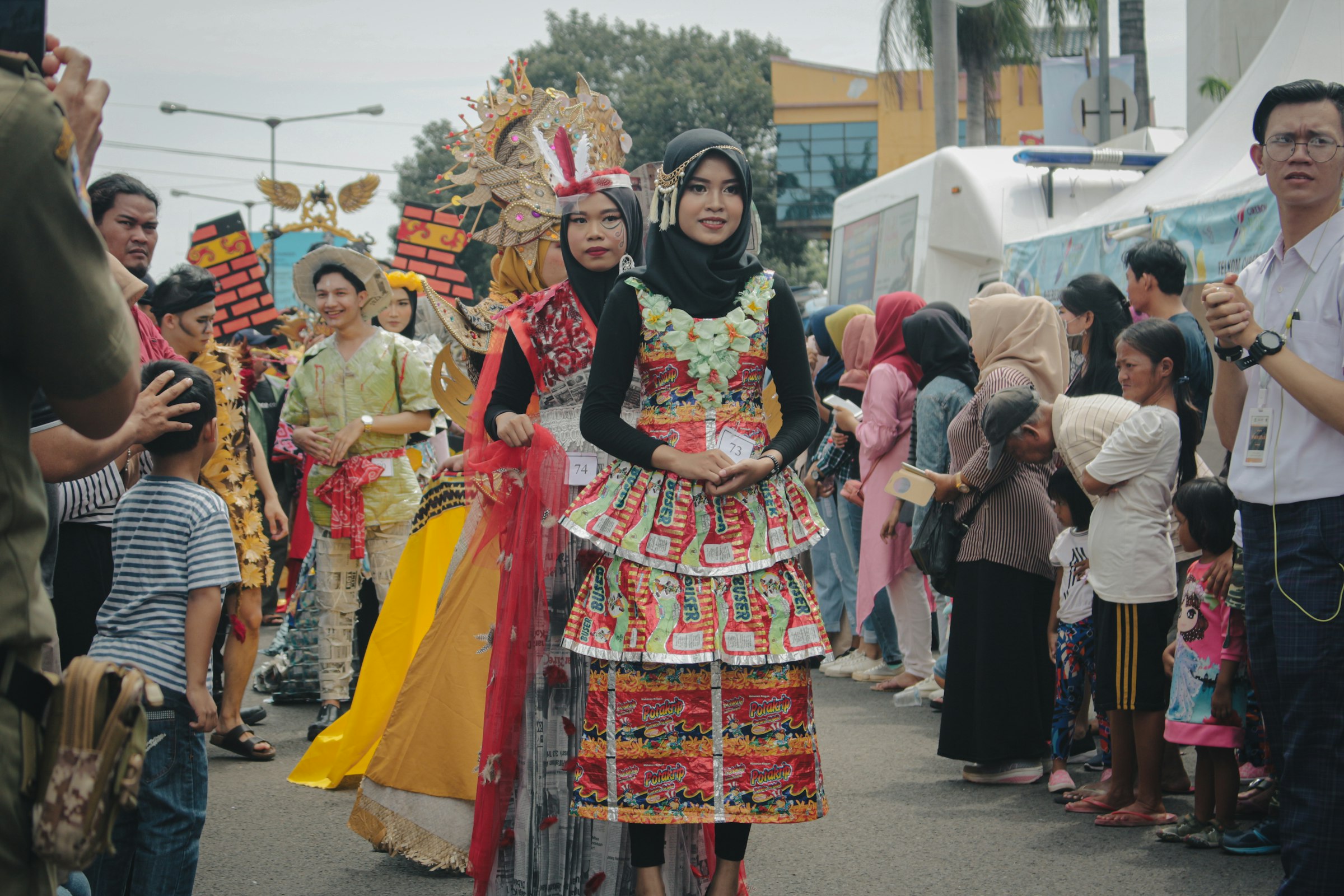 People in colorful traditional costumes at a parade