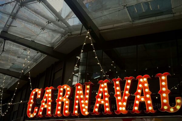 a lighted sign that says lavaraja above it