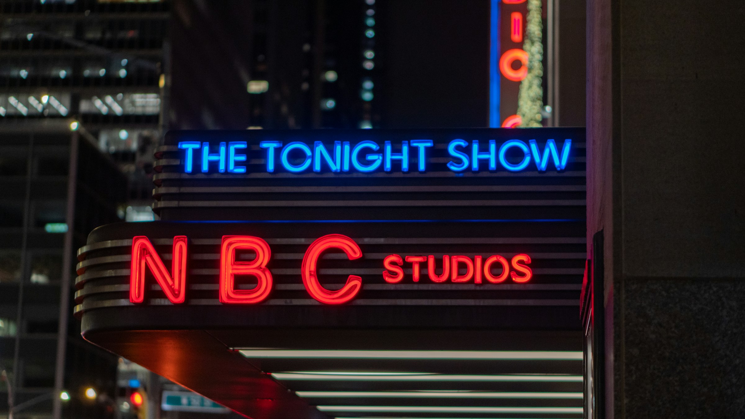 a neon sign that reads the tonight show nbc studios