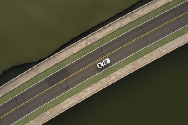 an overhead view of a bridge with cars on it