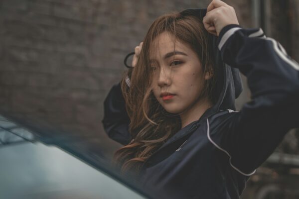 woman turn on hoodie jacket