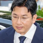 A queda das ações da HYBE e o impacto no futuro do BTS